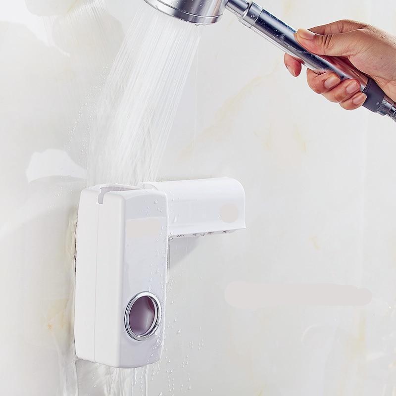 Distributeur de dentifrice avec porte brosse à dent