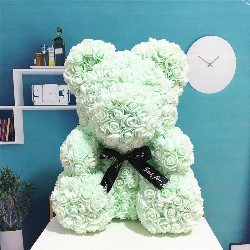 Ourson peluche en roses