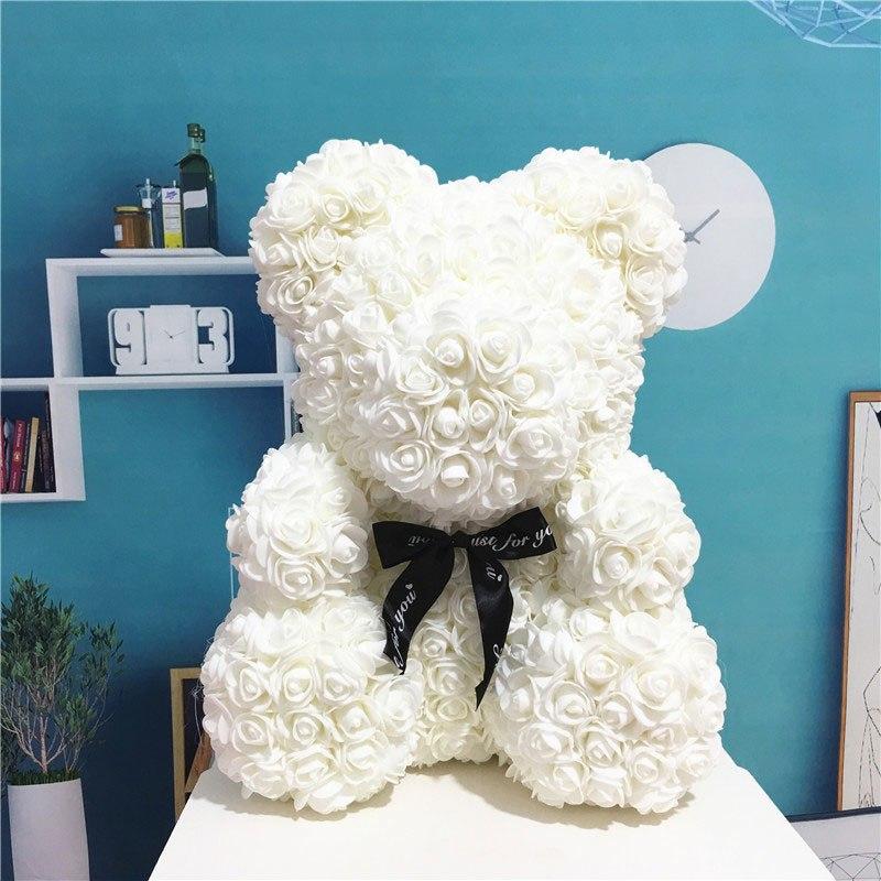 Ourson peluche en roses