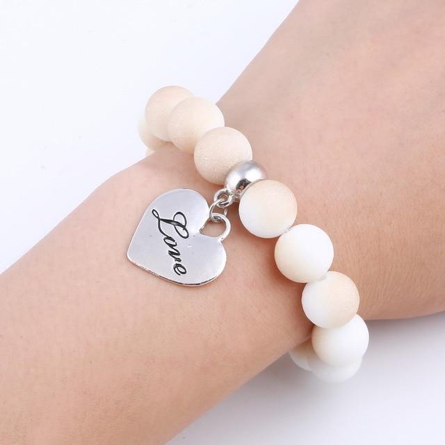 Bracelet perles de cristal avec pendentif cœur