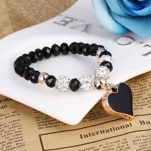 Bracelet perles de cristal avec pendentif cœur