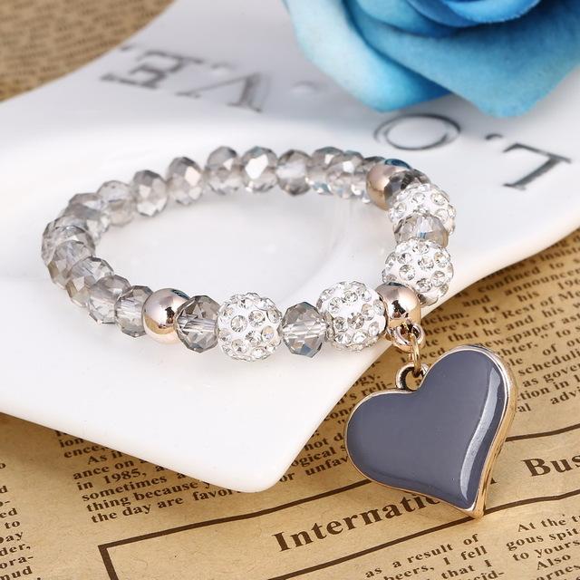 Bracelet perles de cristal avec pendentif cœur