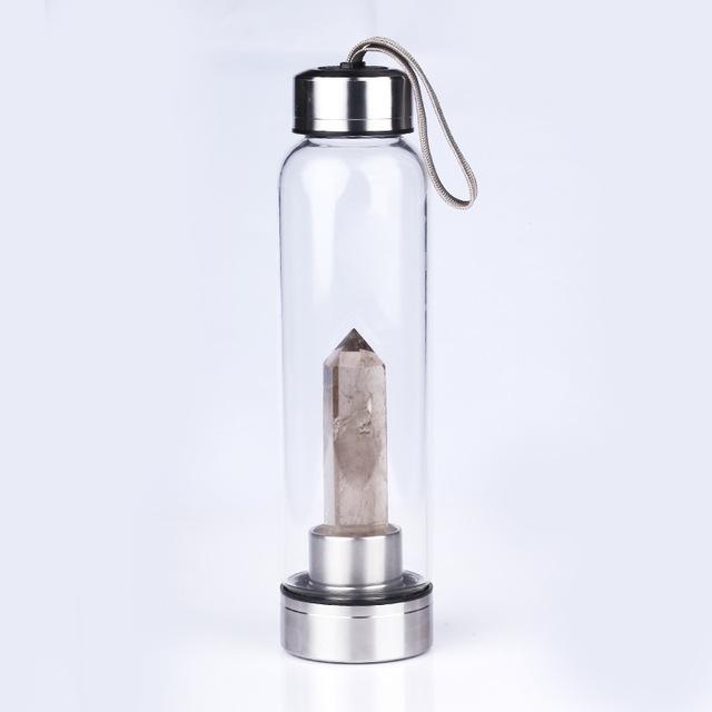 Bouteille d'eau avec pierre précieuse