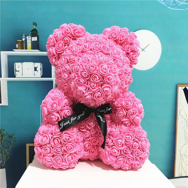 Ourson peluche en roses