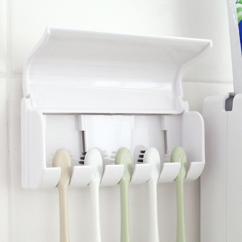 Distributeur de dentifrice avec porte brosse à dent