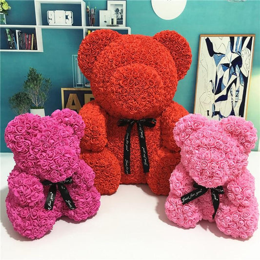 Ourson peluche en roses