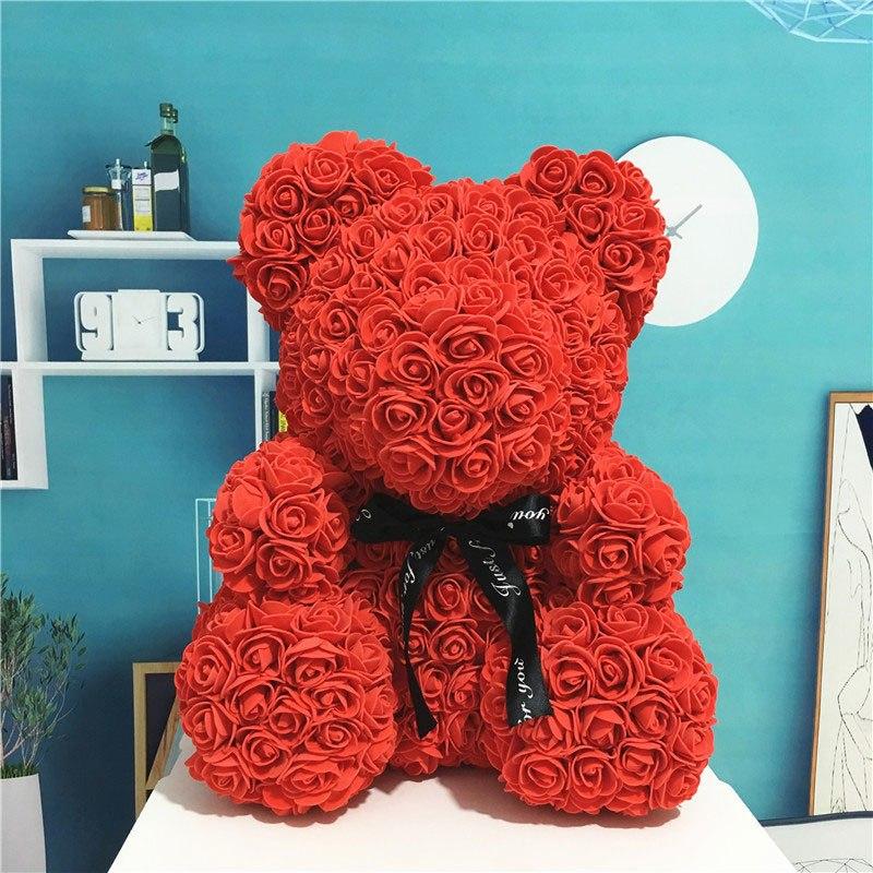 Ourson peluche en roses