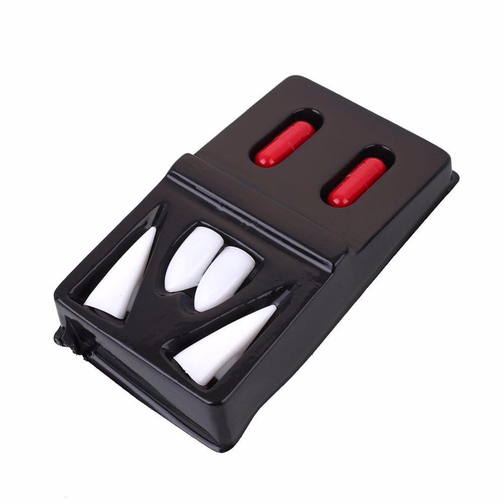 4 fausses dents de vampire+ faux sang