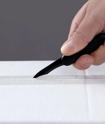 Cutter rétractable avec crochet