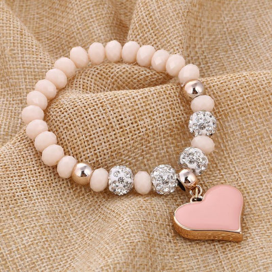 Bracelet perles de cristal avec pendentif cœur