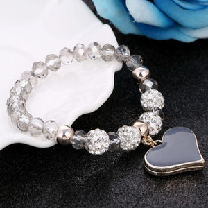 Bracelet perles de cristal avec pendentif cœur