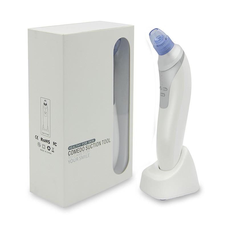 aspirateur points noir avec son chargeur