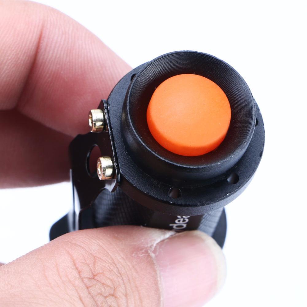 bouton power lampe torche 