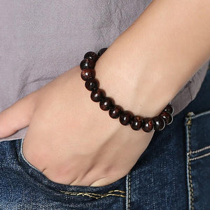 bracelet en bois tibétain noir étatique 