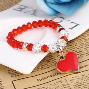 Bracelet perles de cristal avec pendentif cœur