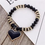 Bracelet perles de cristal avec pendentif cœur