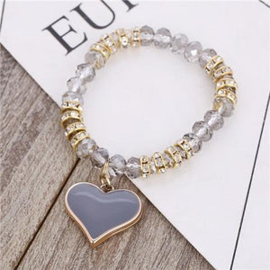Bracelet perles de cristal avec pendentif cœur