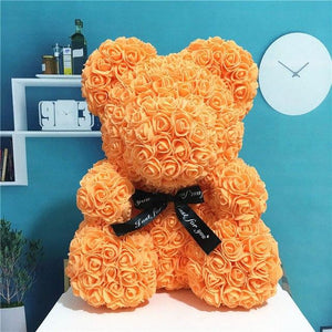 Ourson peluche en roses
